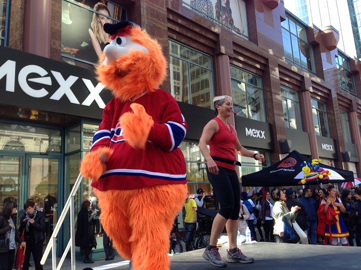 Youppi!, the official mascot for the Montreal Canadiens was on hand for the March of the Umbrellas on October 2, 2014.