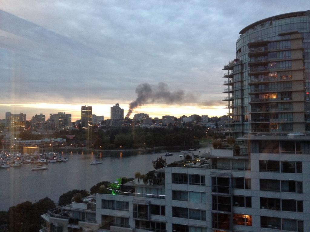Smoke can be seen rising into the sky.