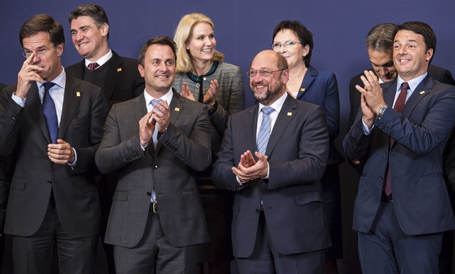 EU heads of state pose for a group photo during an EU summit in Brussels, on Thursday, Oct. 23, 2014. EU leaders gathered Thursday for a two-day summit in which they will discuss Ebola, climate change and the economy.