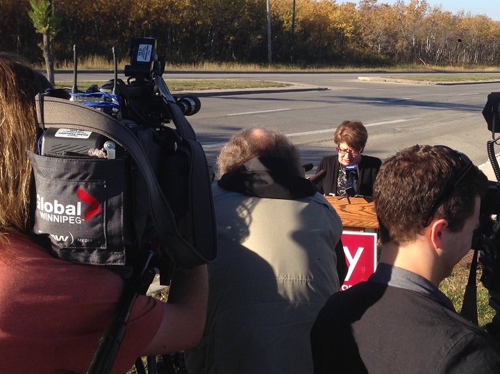 Winnipeg mayoral candidate Judy Wasylycia-Leis makes a campaign announcement on Roblin Boulevard on Tuesday.
