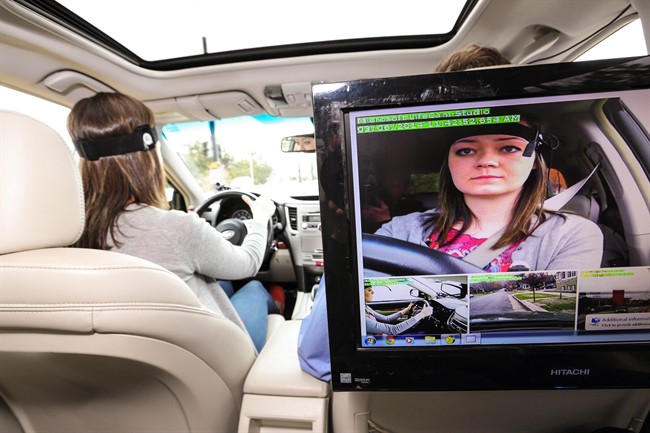 This March 6, 2014, image provided by AAA Foundation via DanCampbellPhotography.com shows driver during the Cognitive Distraction Phase II testing in Salt Lake City. Two new studies have found that voice-activated smartphones and dashboard infotainment systems may be making the distracted-driving problem worse.