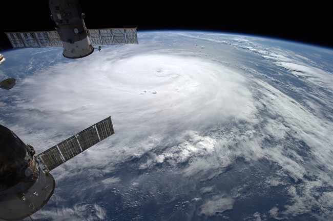 This image provided by NASA shows Hurricane Gonzalo taken from the International Space Station by European Space Agency astronaut Alexander Gerst as it moves toward Bermuda on Thursday, Oct. 16, 2014. 