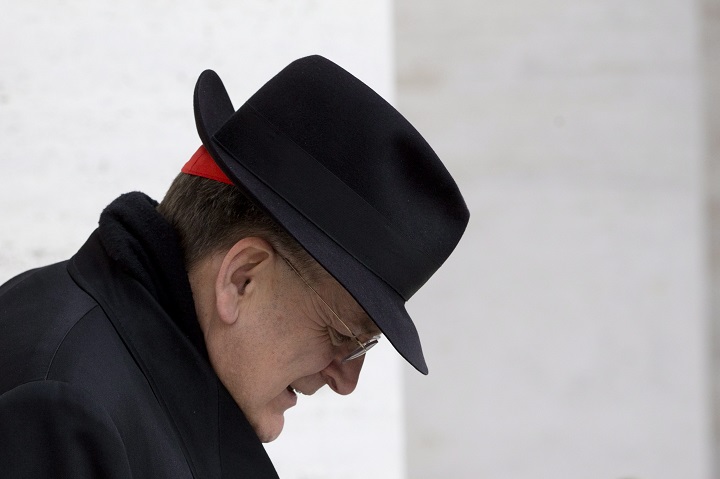 Cardinal Raymond Leo Burke, of the United States, leaves at the end of a meeting at the Vatican, Monday March 11, 2013. 