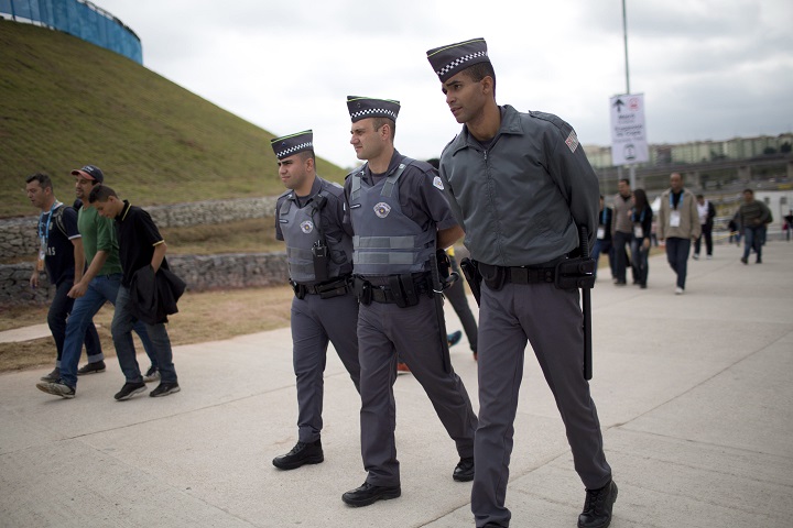 Police patrol outside Arena Corinthians stadium in Sao Paulo, Brazil, Wednesday, June 11, 2014. 