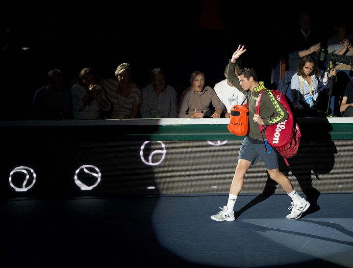 Milos Raonic of Canada arrives on the court prior to a final match against  Serbia's Novak Djokovic at the ATP World Tour Masters tennis tournament at Bercy stadium in Paris, France,  Sunday, Nov. 2, 2014. 