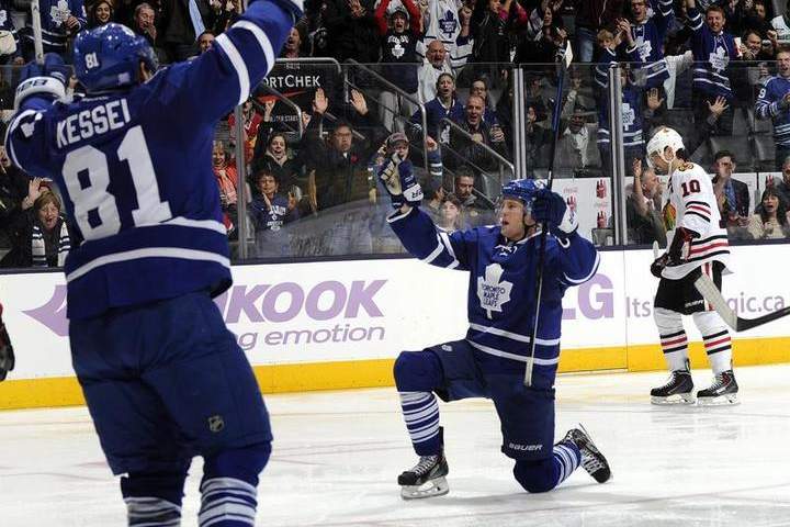 Peter Holland #24 of the Toronto Maple Leafs celebrates his goal against the Chicago Blackhawks during NHL game action November 1, 2014 at the Air Canada Centre in Toronto, Ontario, Canada.