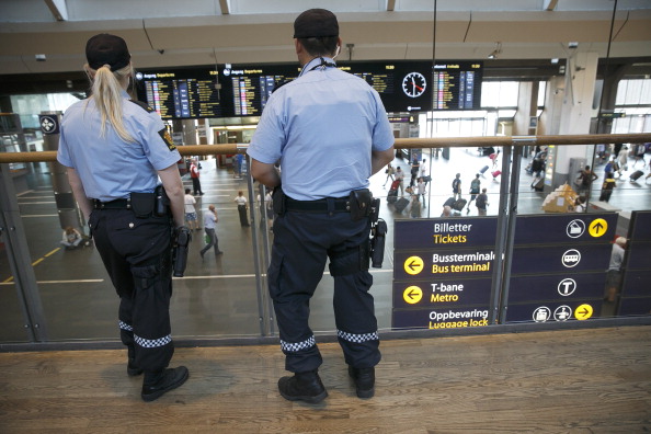 Armed police patrolat the Central railway station because of a possible terror attack by jihadits returning from Syria on July 25, 2014 the day after Norway stepped up security.