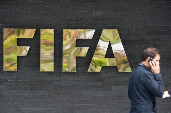 Picture shows the logo of the FIFA in front of the organisation's head office  in Zurich on September 26, 2014.