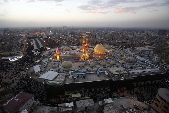 A picture taken on November 3, 2014 shows the shrines of Shiite Muslim Imam Hussein (front) and Imam Abbas (background) in the central city of Karbala 80 km (50 miles) southwest of Baghdad. Millions of Shiite Muslims pilgrims will pour into the Iraqi shrine city of Karbala for the peak of commemorations for Ashura which commemorates the 7th century killing of Imam Hussein, the grandson of Prophet Mohammed, in the Battle of Karbala. 