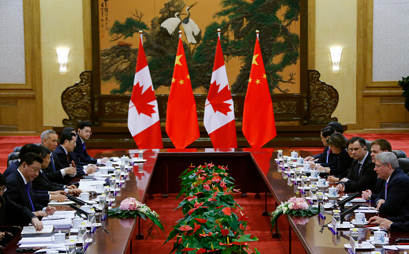 Canadian Prime Minister Stephen Harper (R) holds meetings with Chinese President Xi Jinping (L) during an APAC Bilateral Meeting at the Great Hall of the People on November 9, 2014 in Beijing, China. 