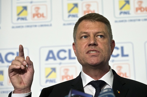 Opposition's presidential candidate Klaus Iohannis adresses the media shortly after exit polls of the second round of Romania's presidential elections were announced in Bucharest on November 16, 2014. 
