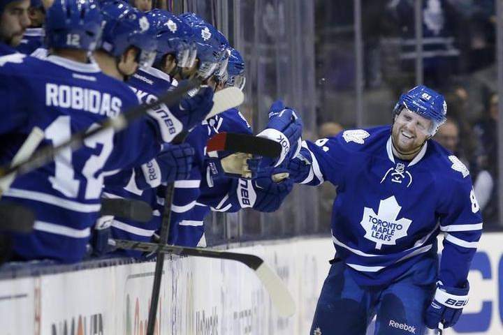 Leafs Phil Kessel celebrates his early 2nd period goal, and 2nd of the night. Toronto Maple Leafs vs Boston Bruins during 2nd period action at the Air Canada Centre of the NHL Season on November 12, 2014.