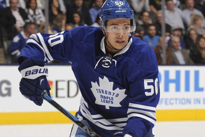 Stuart Percy #50 of the Toronto Maple Leafs skates during NHL game action against the Detroit Red Wings October 17, 2014 at the Air Canada Centre in Toronto, Ontario, Canada.