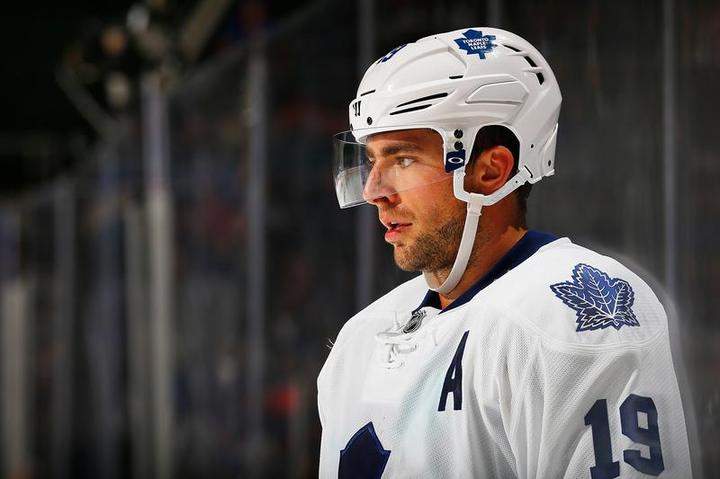 Joffrey Lupul #19 of the Toronto Maple Leafs skates against the New York Islanders at Nassau Veterans Memorial Coliseum on October 21, 2014 in Uniondale, New York. 