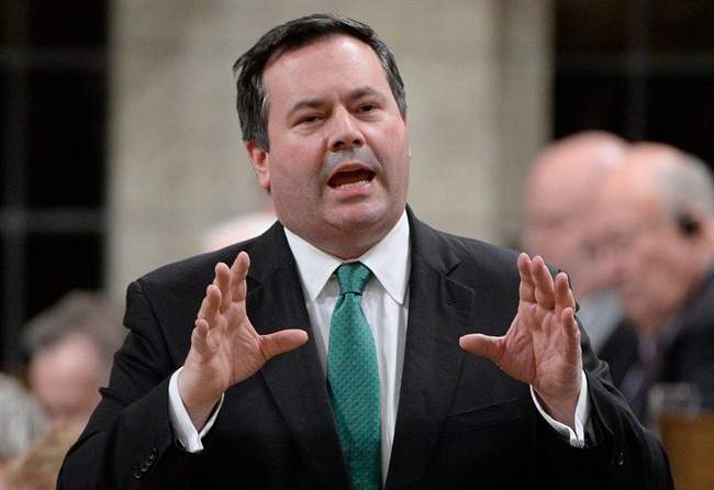 Employment Minister Jason Kenney answers a question during Question Period in the House of Commons on Parliament Hill in Ottawa, in Nov. 2014.