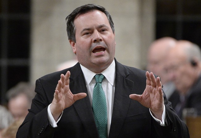 Employment Minister Jason Kenney answers a question during Question Period in the House of Commons on Parliament Hill in Ottawa, in Nov. 2014.