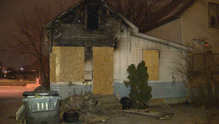 A train delayed Saskatoon firefighters responding to a house fire in Pleasant Hill Tuesday evening.