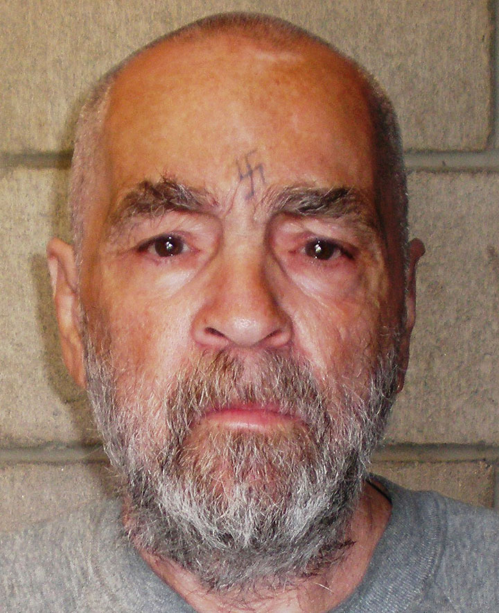 In this handout photo from the California Department of Corrections and Rehabilitation, Charles Manson, 74, poses for a photo on March 18, 2009 at Corcoran State Prison, California.
