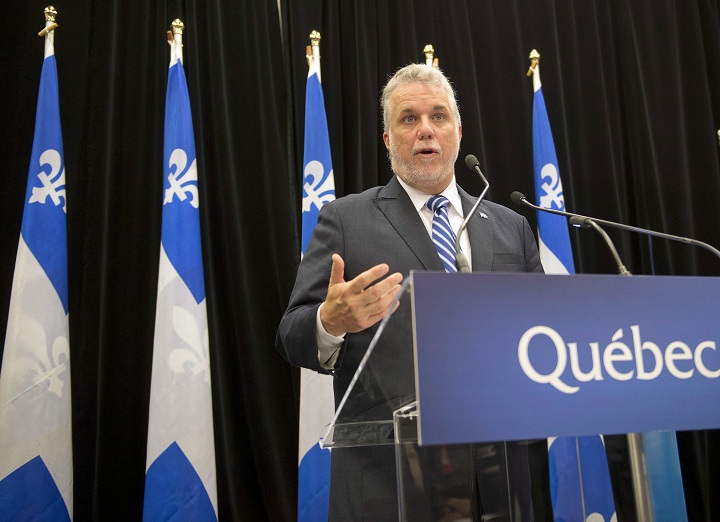Quebec Premier Philippe Couillard speaks to the media at a news conference Tuesday in Montreal.