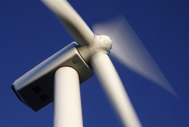 Blades rotate on a wind turbine on Stetson Mountain in Range 8, Township 3, Maine in July, 2009. 
