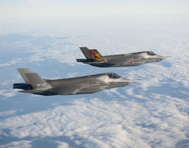 Two Lockheed Martin F-35B aircraft fly in formation on Nov. 10, 2010 at Naval Air Station Patuxent River, Md.
