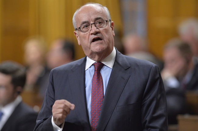 Veterans Affairs Minister Julian Fantino answers a question during Question Period in the House of Commons on Parliament Hill in Ottawa, Thursday Sept.18, 2014 . Fantino says the department's $1.1 billion dollars in unused funding over seven years is "not lost money.".
