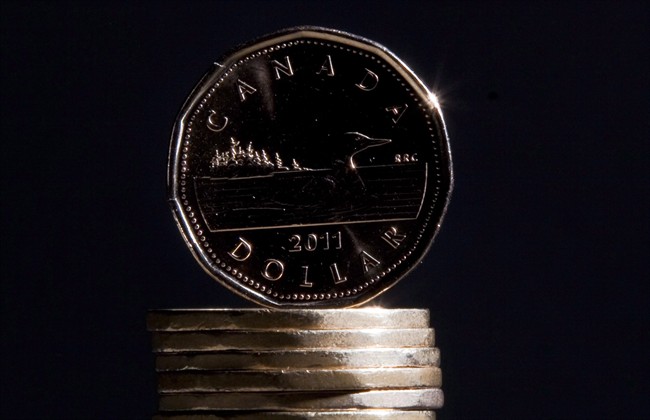 The loonie is poised to fall further against the U.S. dollar next month when rates start rising stateside.