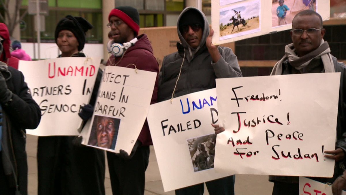 Members of Calgary's Sudanese community  gather downtown to protest alleged atrocities by the Sudanese government.