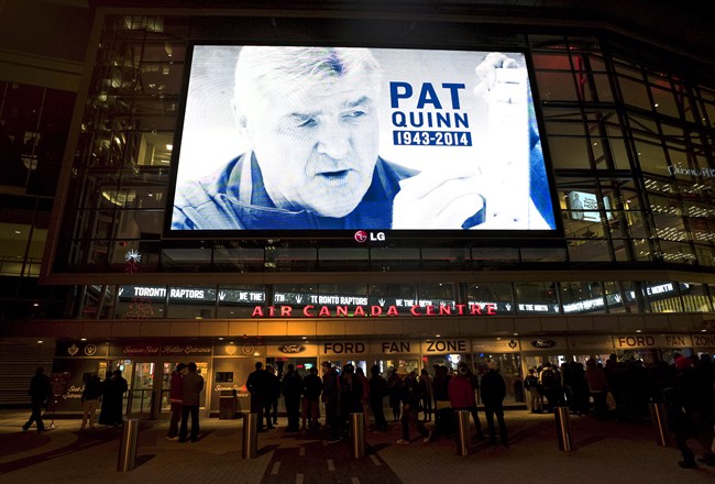A tribute to late hockey player and coach Pat Quinn is displayed on a video screen at the Air Canada Centre in Toronto on Monday, November 24, 2014. THE CANADIAN PRESS/Darren Calabrese.