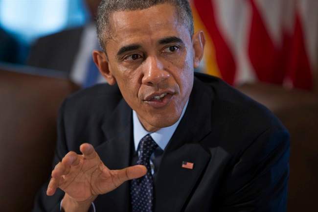 President Barack Obama speaks to the media before a meeting with his cabinet members in the White House Cabinet Room in Washington, Friday, Nov. 7, 2014. A senior military official says that American military advisory teams will now go to Iraq’s western Anbar province where Islamic State militants have been gaining ground and slaying men, women and children. The teams are part of President Barack Obama’s new directive to expand the U.S. mission in Iraq by deploying another 1,500 U.S. troops to serve as advisers, trainers and security personnel. (AP Photo/Evan Vucci).