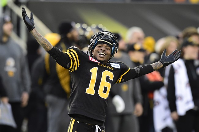 Hamilton Tiger-Cats wide receiver Brandon Banks celebrates on the sidelines during second half action against the Montreal Alouettes in the CFL Eastern Division final in Hamilton, Ont., on Sunday, Nov. 23, 2014. THE CANADIAN PRESS/Frank Gunn.