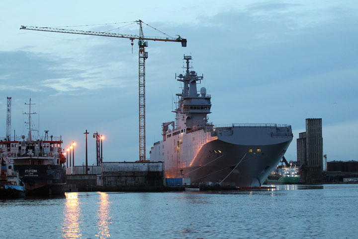 This Friday, Nov.14, 2014 file photo shows the Vladivostok Mistral-class helicopter carrier docking at Saint-Nazaire harbour, western France. 