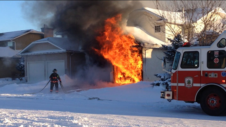 Saskatoon firefighters extinguish garage fire in the Arbor Creek neighbourhood Saturday afternoon.