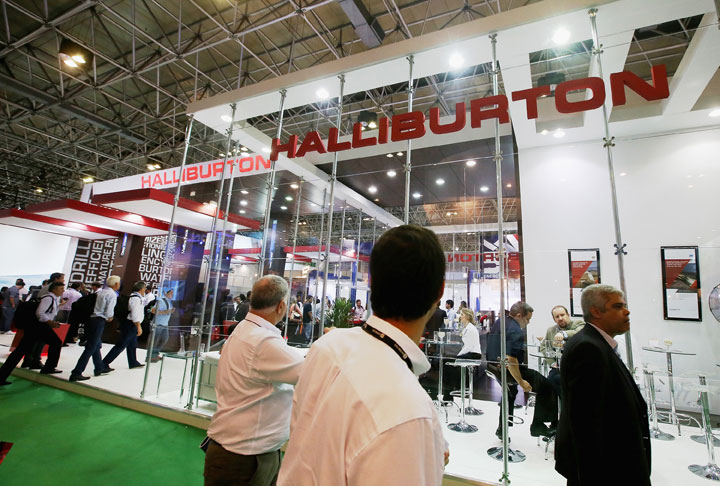 Visitors gather at the Halliburton booth at the Rio Oil & Gas Expo and Conference on September 16, 2014 in Rio de Janeiro, Brazil. 