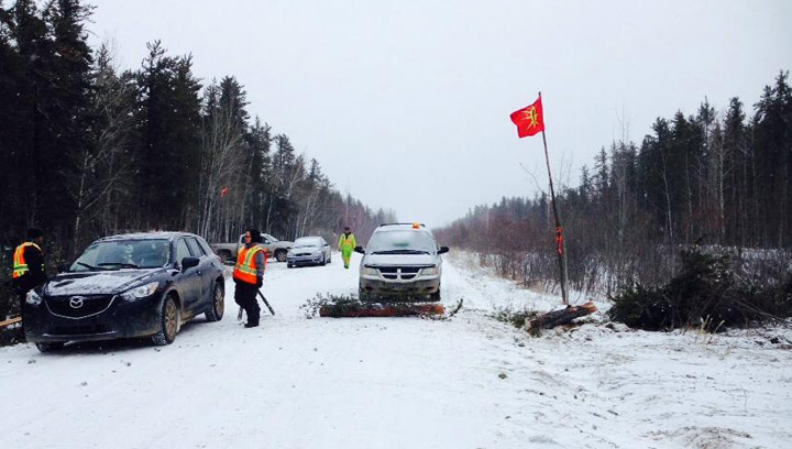 Trappers block northern Saskatchewan road, say industry must consult with them to protect the land, water, animal populations.