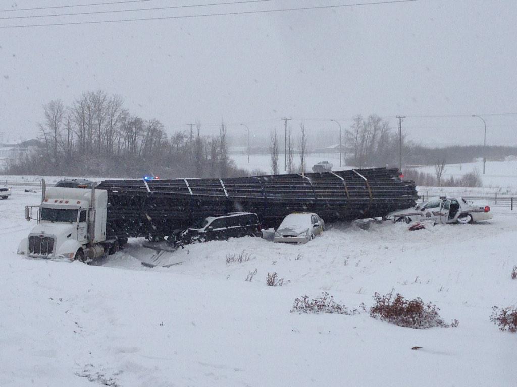 An officer was sent to hospital after this semi lost control on Highway 2 near Red Deer.