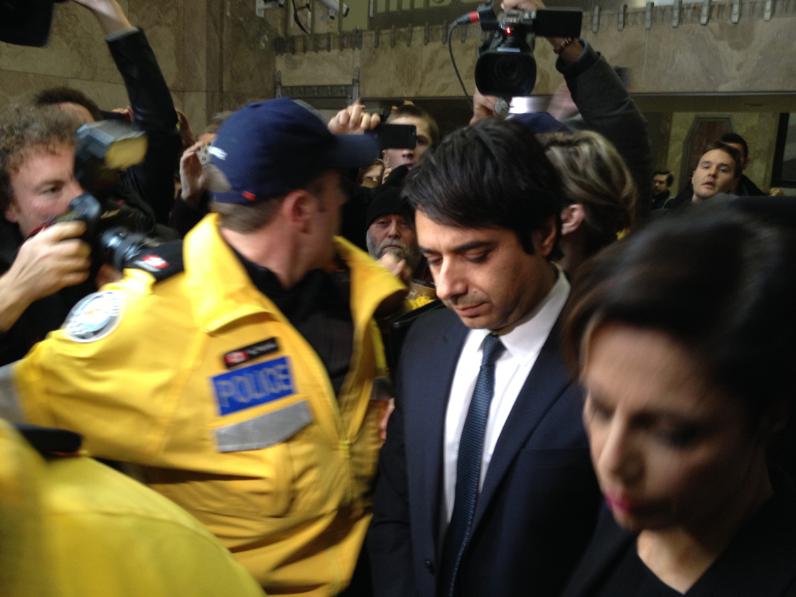 Jian Ghomeshi exits a Toronto courtroom after being released on $100,000 bail