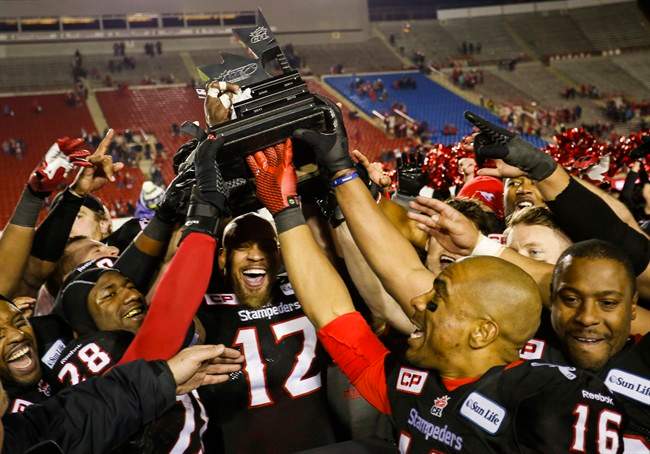 Calgary Stampeders celebrate winning the CFL Western Final in Calgary, Sunday, Nov. 23, 2014.
