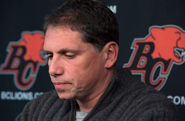 B.C. Lions head coach Mike Benevides pauses for a moment during a news conference at the teams practice facility in Surrey, B.C., on Monday, Nov. 17, 2014. THE CANADIAN PRESS/Jonathan Hayward.