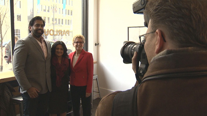 Manitoba Liberal leader Rana Bokhari (centre) with Ontario premier Kathleen Wynne (right) and former Winnipeg Blue Bomber Obby Khan (left) in Winnipeg on Thursday, November 13, 2014.