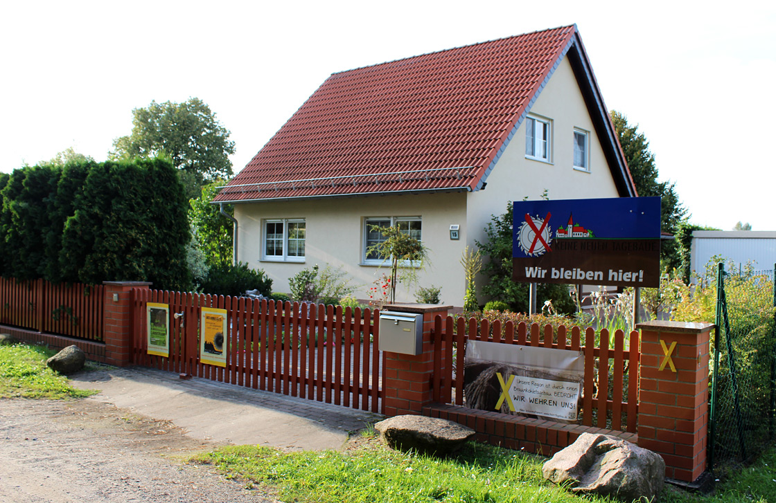 Anti-coal posters in front of a house in Kerkwitz, Germany.