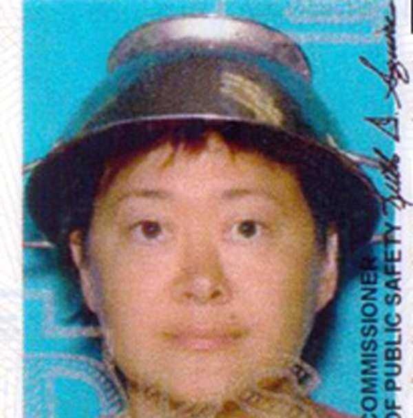 Asia Lemmon, whose legal name appears on her driver’s license as Jessica Steinhauser, is shown wearing a metal colander on her head on her Utah driver's license in this undated photo. 