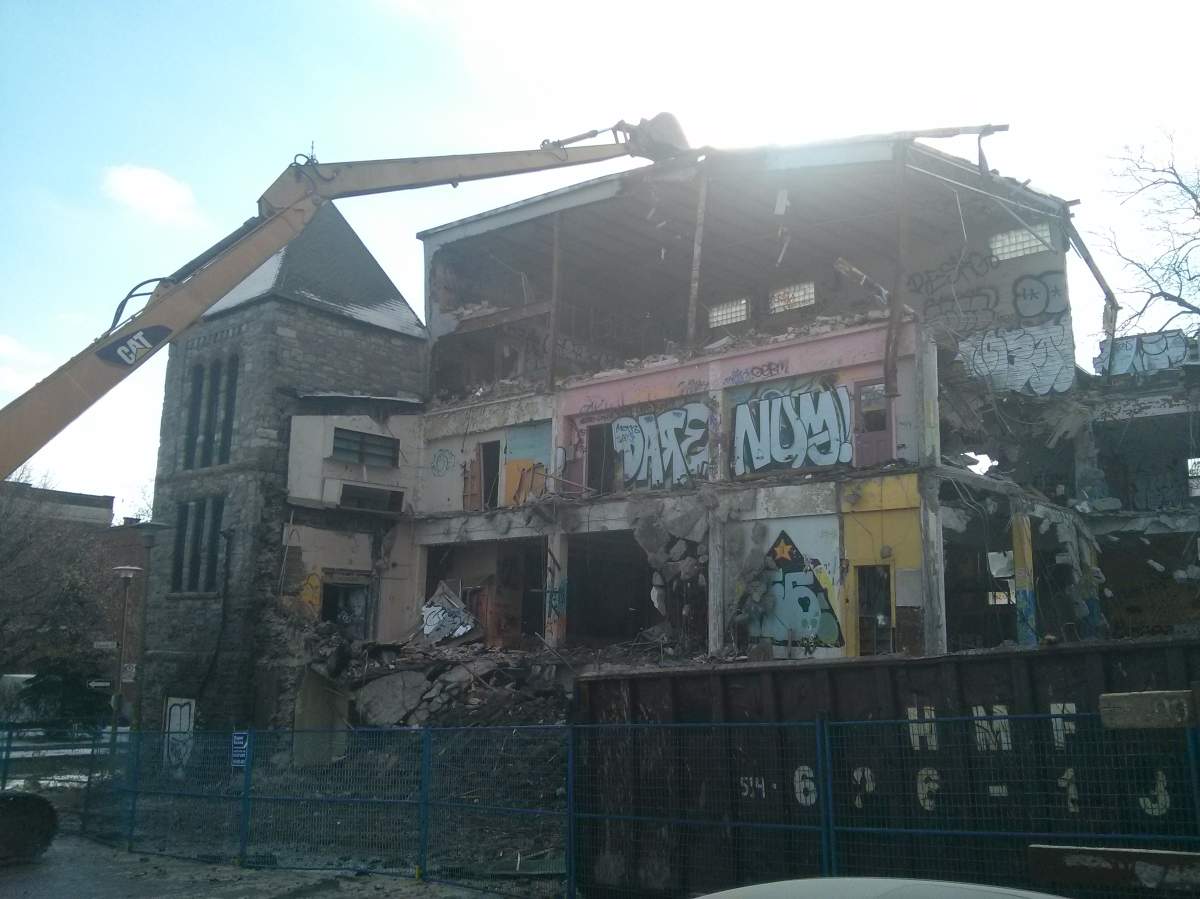 The NCC demolition as the top floor gymnasium came down Thursday. 