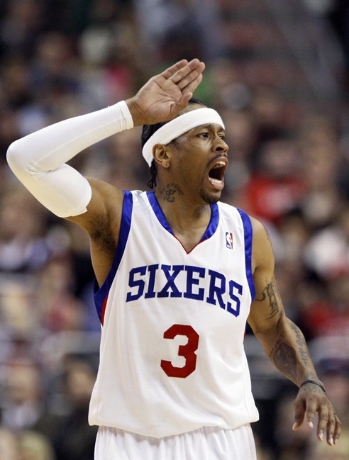 FILE - In this Dec. 7, 2009, file photo, Philadelphia 76ers' Allen Iverson calls out a play to teammates in the first half of an NBA basketball game against the Denver Nuggets in Philadelphia. Nike is pulling back on plans for a shoe that sneakily honors Allen Iverson after the former NBA superstar demanded answers. Iverson says Nike used his identity, likeness and persona without permission for a sneaker out of the company's Zoom Flight ’96 collection. The ambiguously titled sneaker has the No. 3 _ Iverson’ number _ on each back heel and the red, white and blue colors of the Philadelphia 76ers. Nike spokesman KeJuan Wilkins said in a statement Thursday that the version of the shoe Iverson protested won’t hit stores.