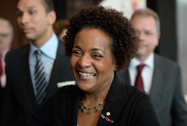 Former Governor General Michaelle Jean smiles after being chosen as the new Secretary-General of La Francophonie during the Francophonie Summit in Dakar, Senegal on Sunday, November 30, 2014.