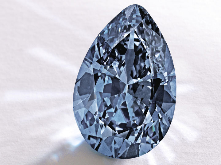 In this image provided by Sotheby’s shows a Fancy Vivid Blue pear-shaped diamond from the estate of Rachel "Bunny" Mellon which sold Thursday Nov. 20, 2014 for $32.6 million. 