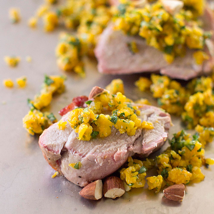This Nov. 10, 2014 photo shows pork tenderloin with butternut squash pesto in Concord, N.H. Pork tenderloin is delicious, tender, and is neutral enough to pair wonderfully with numerous ingredients.