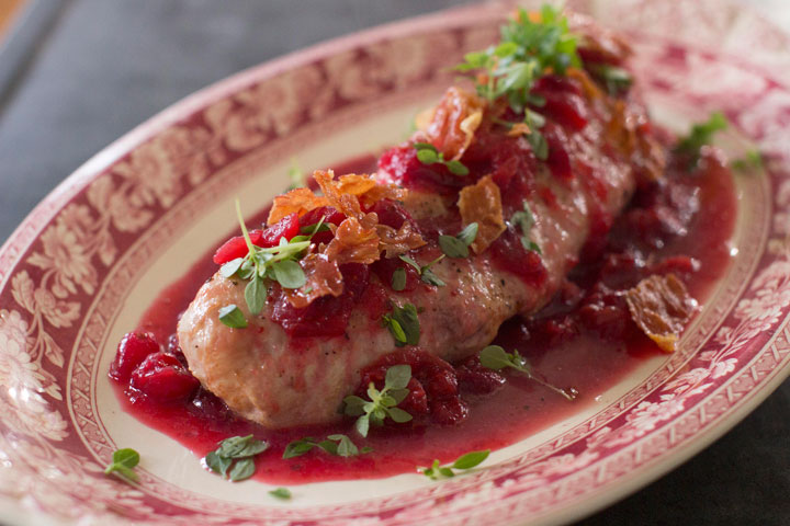 This Nov. 10, 2014 photo shows pork tenderloin with cranberry cider glaze in Concord, N.H. Pork tenderloin is delicious, tender, and is neutral enough to pair wonderfully with numerous ingredients.
