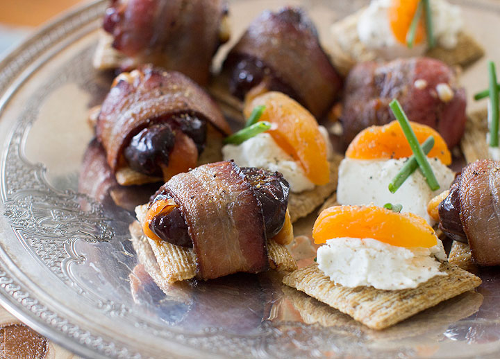 This Nov. 17, 2014 photo shows Triscuits with dates and bacon in Concord, N.H. The woven wheats can be the perfect on-demand base on which to build any number of crowd-pleasing holiday appetizers at the last minute.
