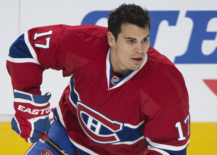 Montreal Canadiens' Rene Bourque warms up prior to an NHL hockey game against the Ottawa Senators in Montreal, Saturday, October 4, 2014.